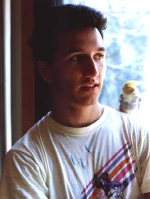 1990 (20 years old) My mom took this picture in my house. We just got Condorito, the bird on my shoulder. 