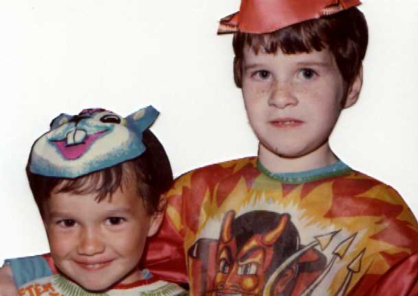 October 1974. My brother and I are all ready to get all those candies for Halloween. I'm looking as mischievous as ever.